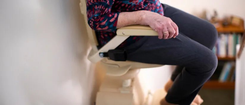 Woman on stair lift